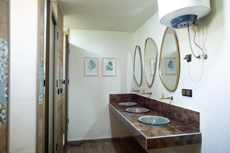 washing room with showers and toilets and anza surfhouse