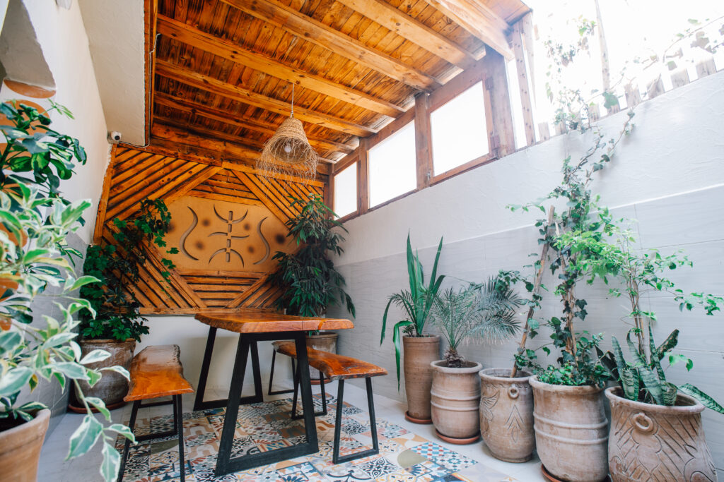 dining area with plants at anza surfhouse