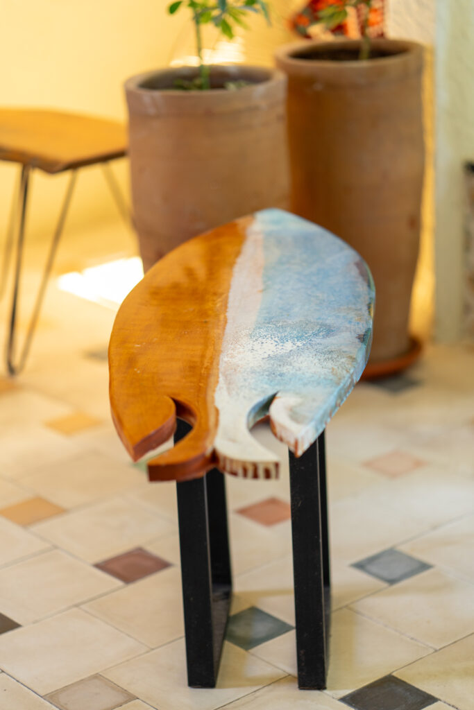 handmade epoxy table imitating the waves and beach