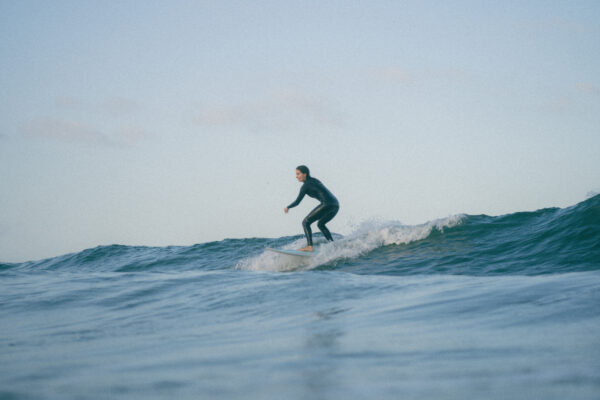 Women surfing in Agadir, Anza